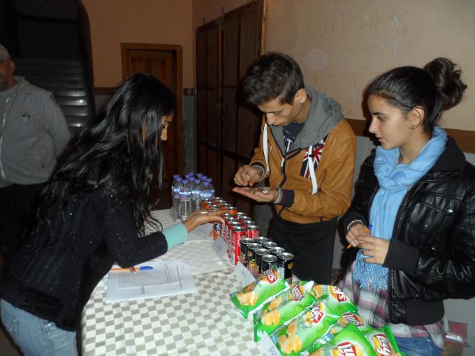 The youth selling tickets and refreshments